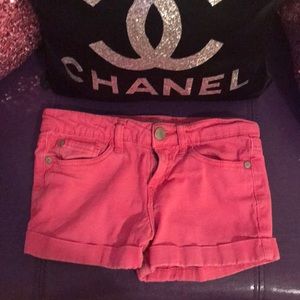 Pink jean shorts.